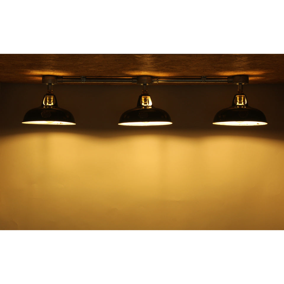 Conduit three way light fitting with shades lit