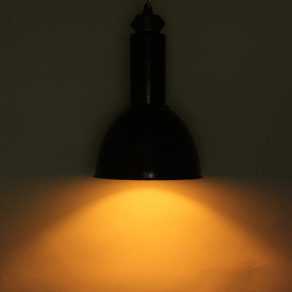 Black Bauhaus light fitting lit